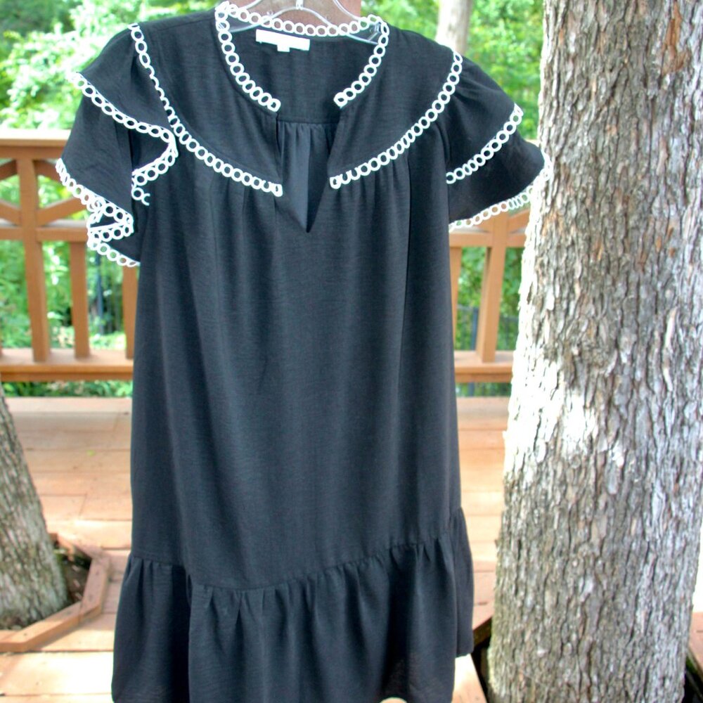 Black dress by Joy Joy